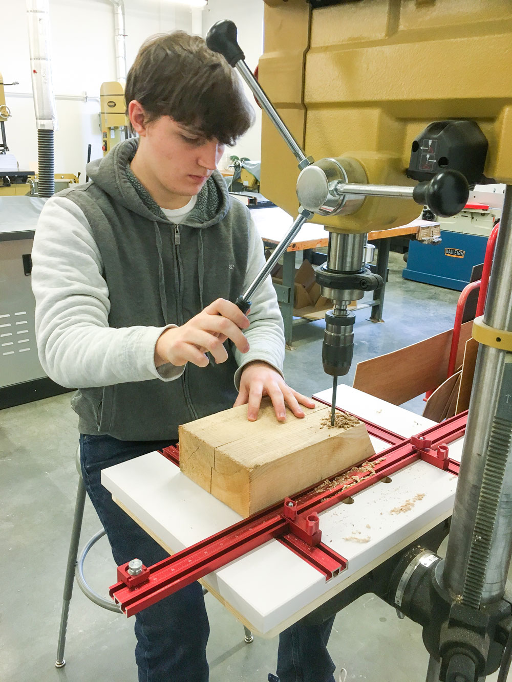 Sam Mackintosh-Smith begins to drill holes in a bee block.