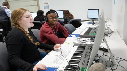 School of Music students work on a computer in a music composition course
