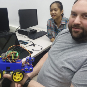 Students work on self-directing robots