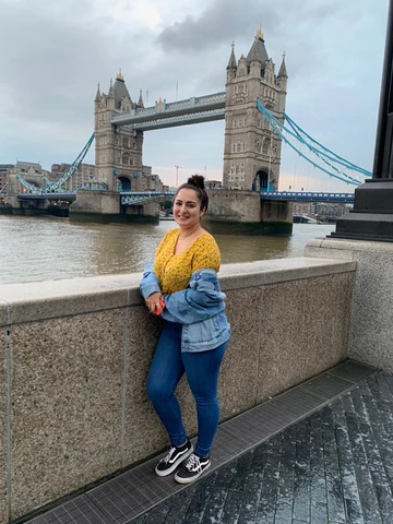 student standing in front of Tower Bridge in London