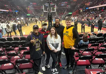 Gathering at their club-level seating are (from left): Jaivon Eggleston, Dr. Sungick Min, Josephine Swift, Robert Casiano III, and Brent Knaisch.
