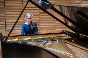 First-place winner of the Claudette Piano Competition Anna Bray performs on the Steinway & Sons grand piano in Rosch Recital Hall.