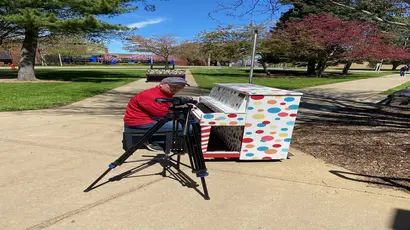 WGRZ-TV shooting a special feature on the Fredonia Street Pianos.